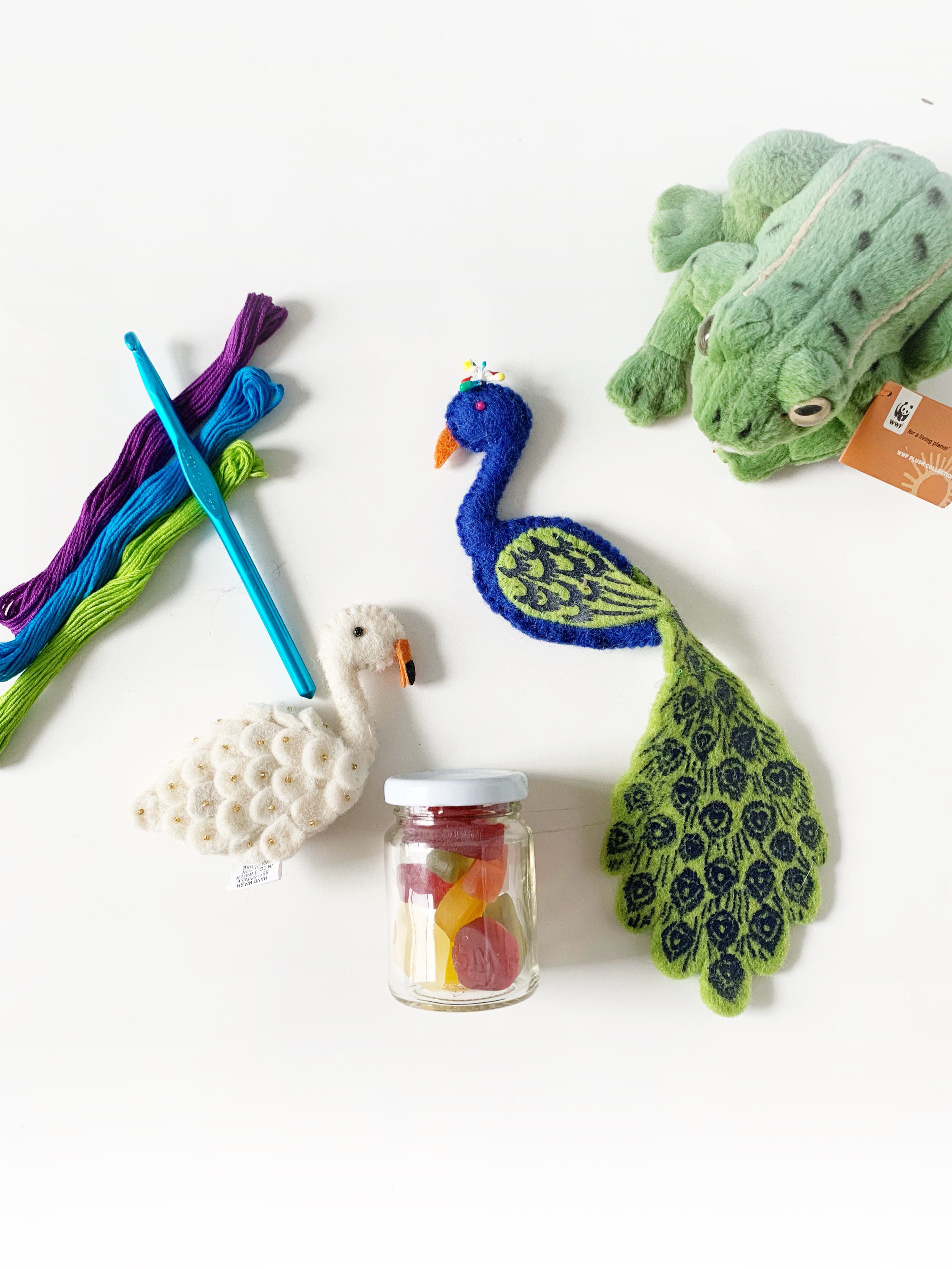 Embroidery floss, crochet hook, finger puppets and bulk candy all make great plastic free, zero waste stocking stuffer ideas for kids. 